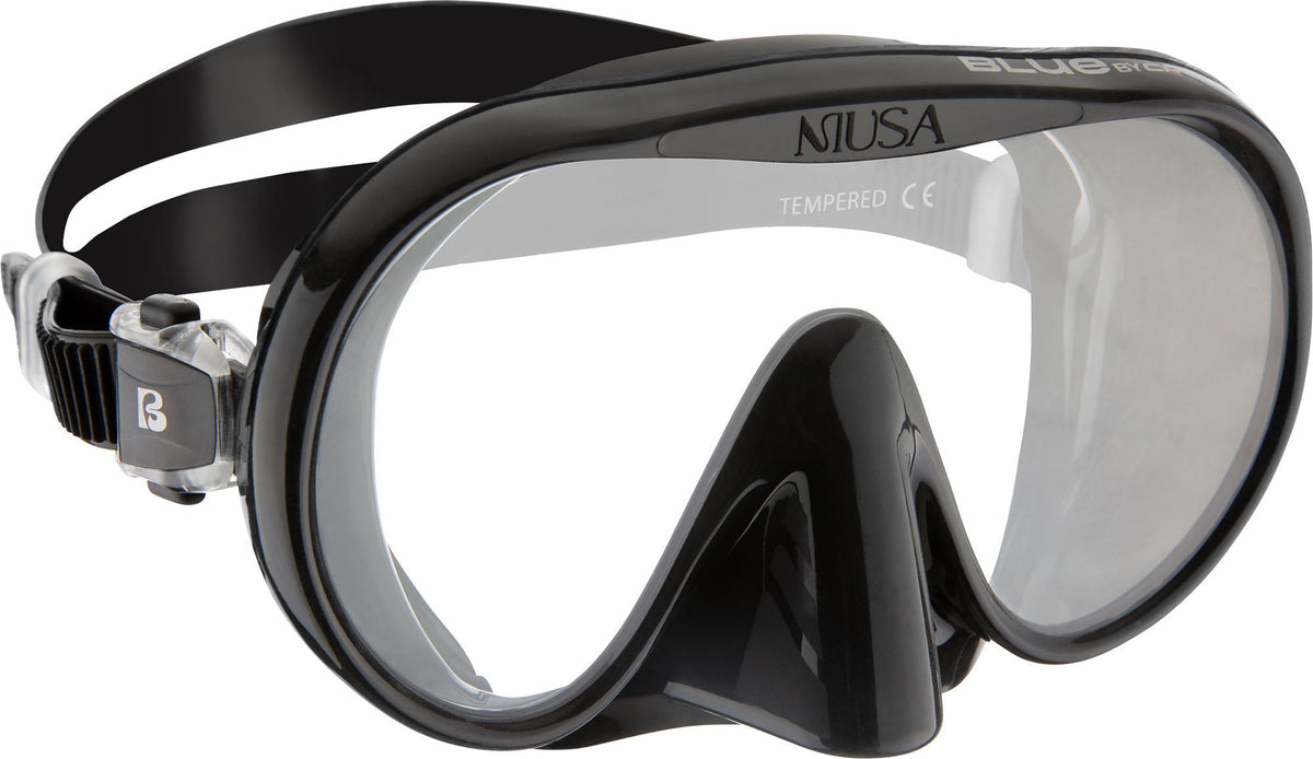 Black Musa frameless mask with a clear tempered lens and black strap, seen at an angle