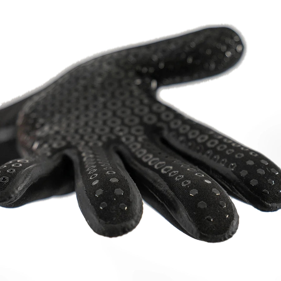 Pair of black Fourth Element 3mm neoprene dive gloves worn on the hands, one turned to show the textured grip palm
