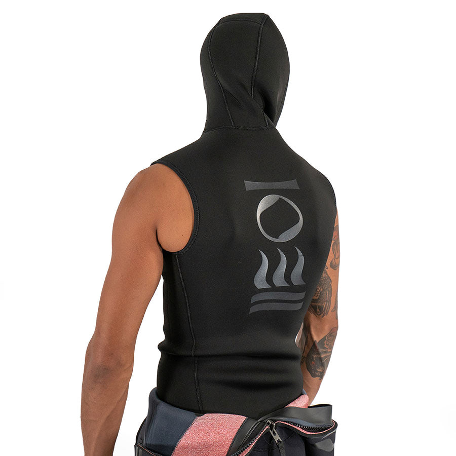 Men's Fourth Element neoprene hooded vest in black worn front on with the hood up