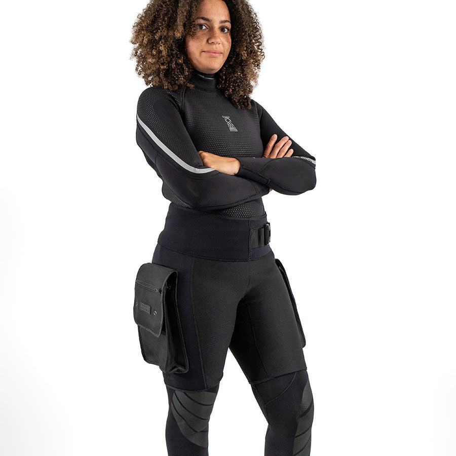 Fourth Element Technical shorts in black shown flat with the webbing belt and both thigh pockets