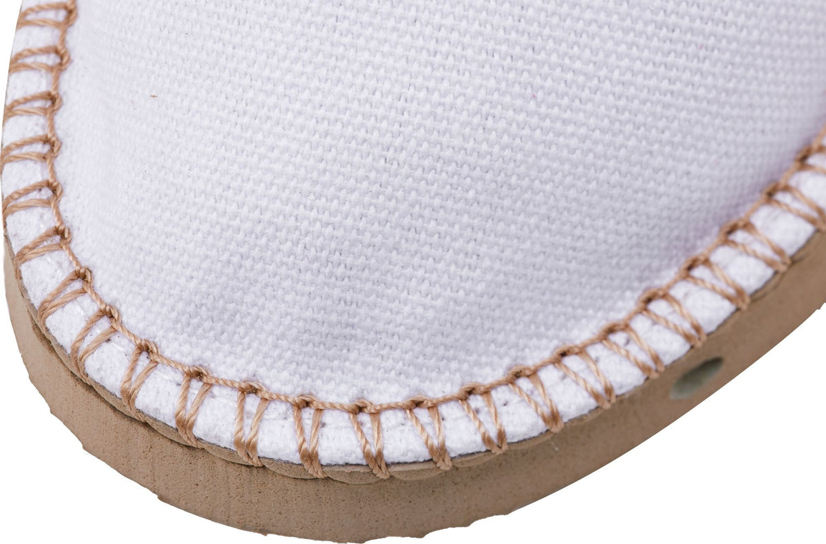 Cressi Valencia Espadrillas in white, close-up of the toe stitching and tan sole edge