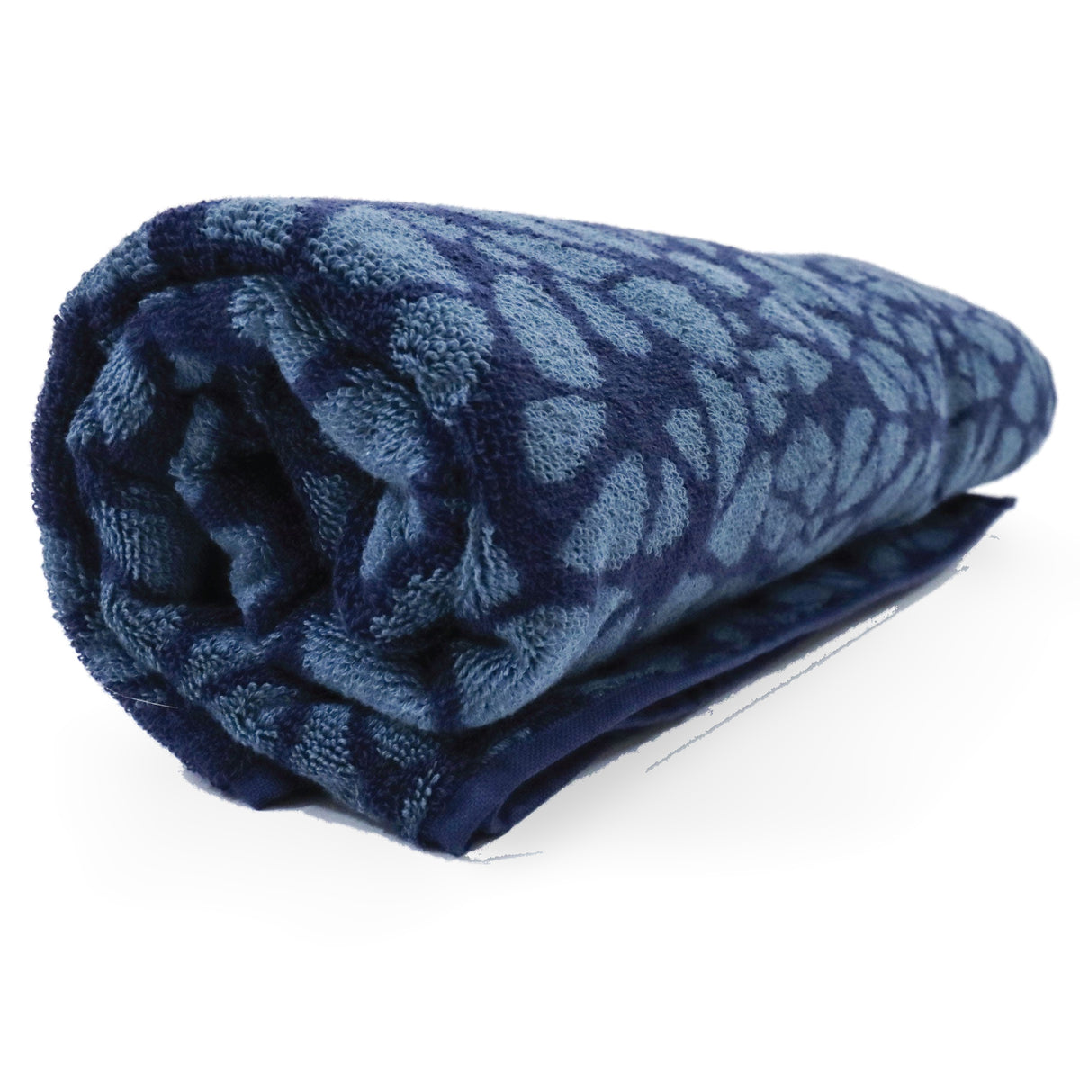 Fourth Element OceanPositive beach towel laid flat, showing the blue cell print and centre logo