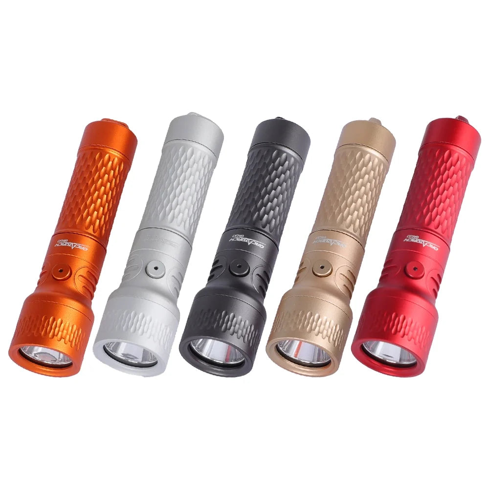 OrcaTorch ORCA7 backup dive lights standing in a row, showing several of the finishes built