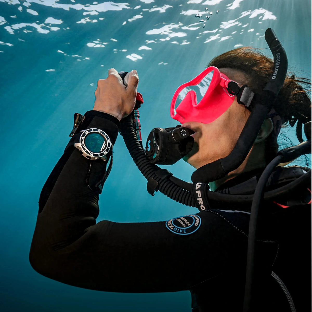 A diver breathing from a regulator underwater