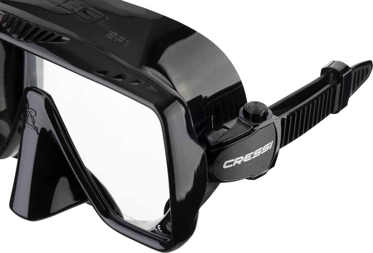 Black SF1 angled to show the low-profile skirt and the strap adjustment