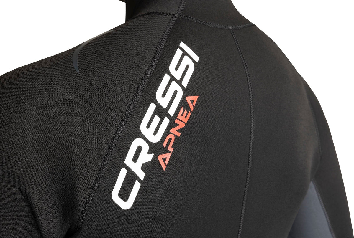 Close-up of the white Cressi Apnea print across the shoulder of the suit