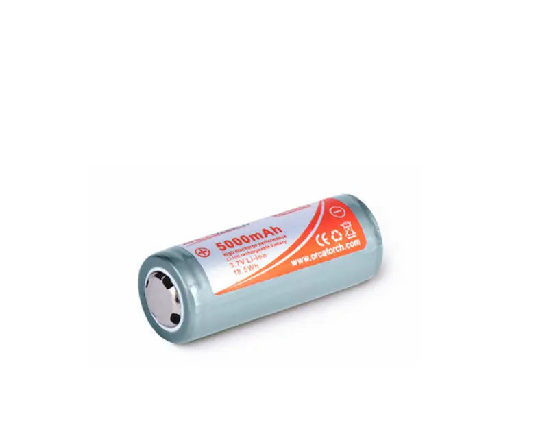 OrcaTorch 26650 rechargeable cell lying flat, showing the terminals