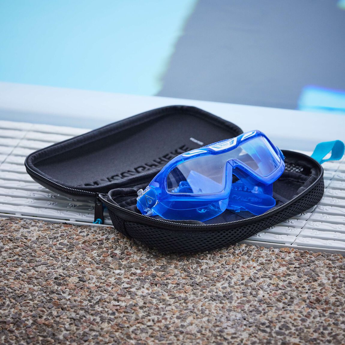 Aquasphere Swim Mask Case closed, black shell with a light blue pull tab