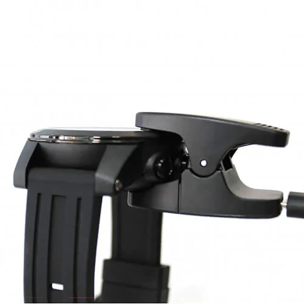 Crest CR-5 charging clip attached to the side of a dive computer