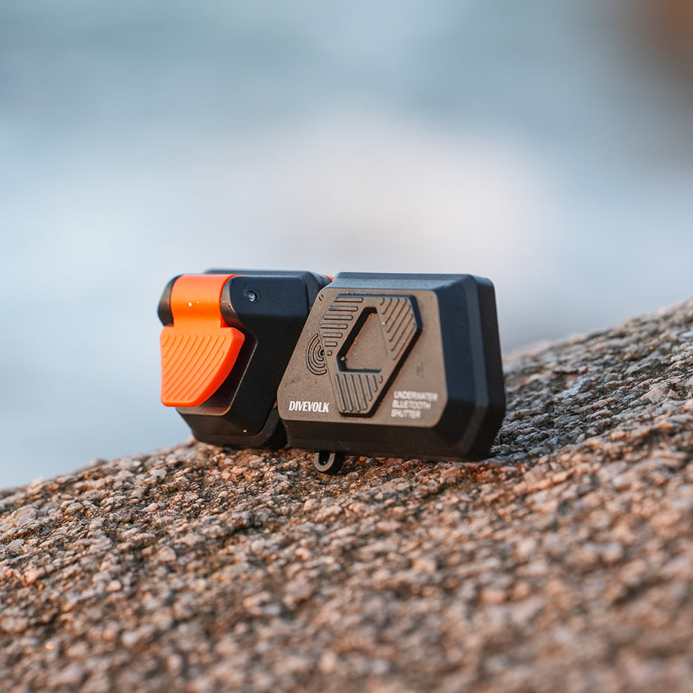 Divevolk underwater external Bluetooth shutter with orange button