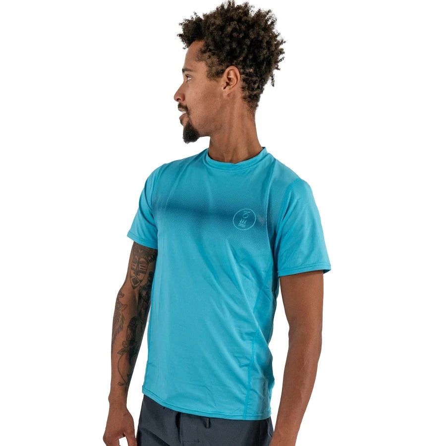 Men's Fourth Element OceanPositive short-sleeve Hydro-T in bright blue worn by a model
