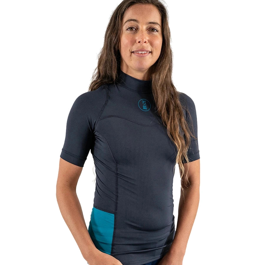 Women's Fourth Element Hydroskin short-sleeve top in navy, worn with the teal hip panel visible