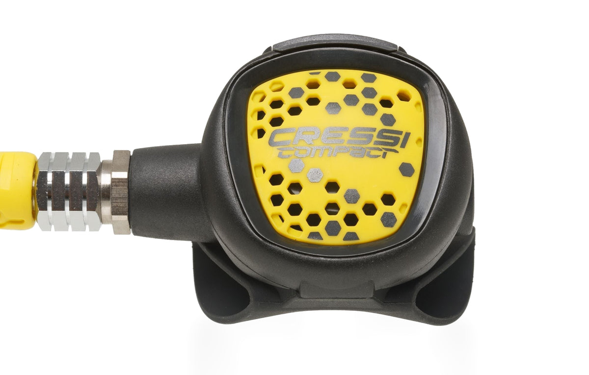 Yellow octopus set against a grey ground with the hose fitted