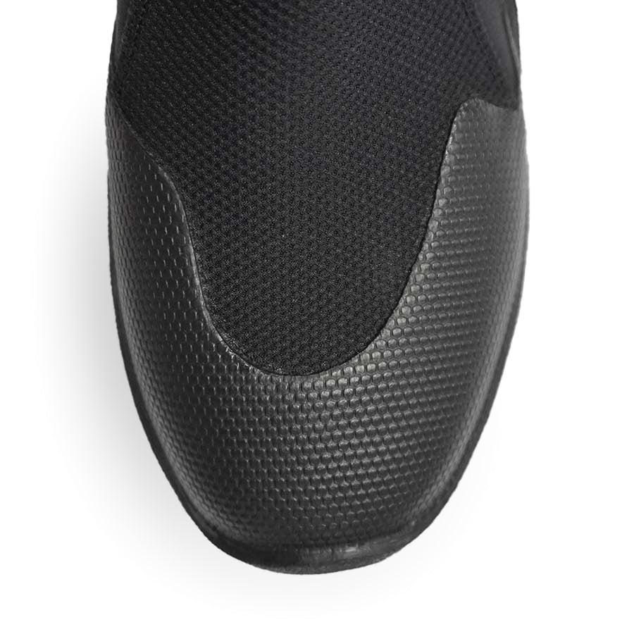 Pair of black Fourth Element Rock Hopper 3mm low-cut boots worn on the feet