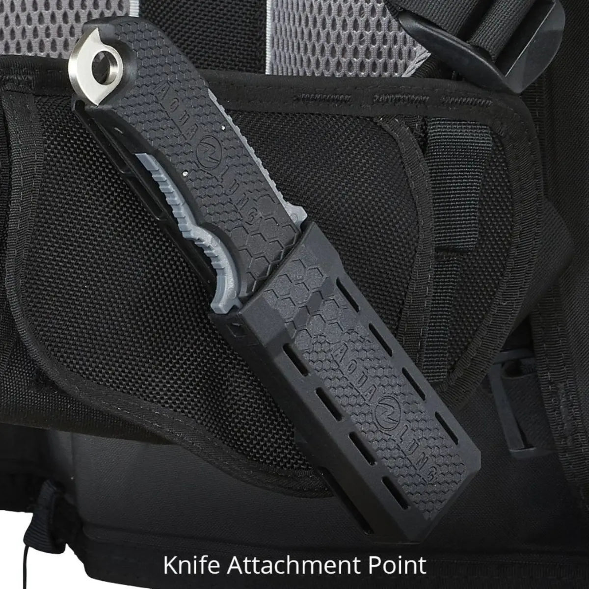 Aqua Lung Rogue buoyancy compensator knife attachment point, a dive knife mounted on the harness webbing
