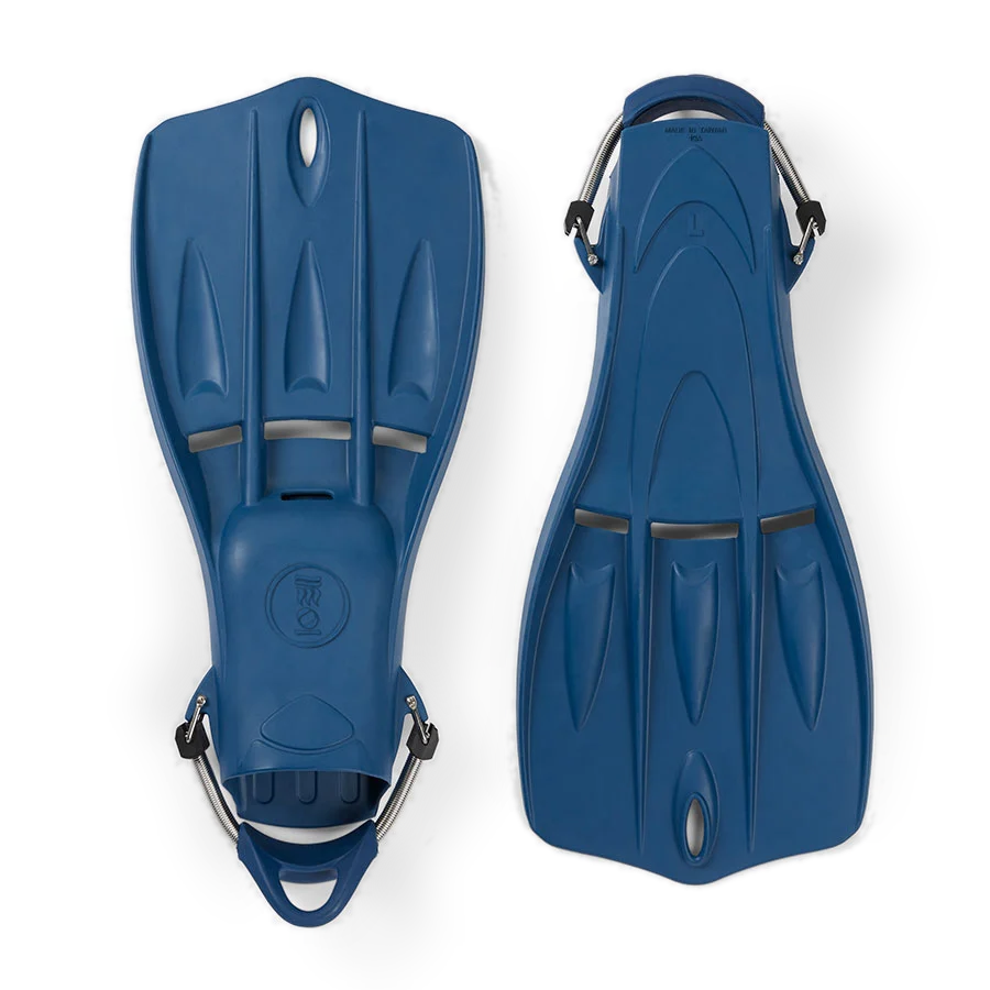 Pair of Fourth Element Tech fins in grey with orange spring straps, shown blade up and foot pocket up