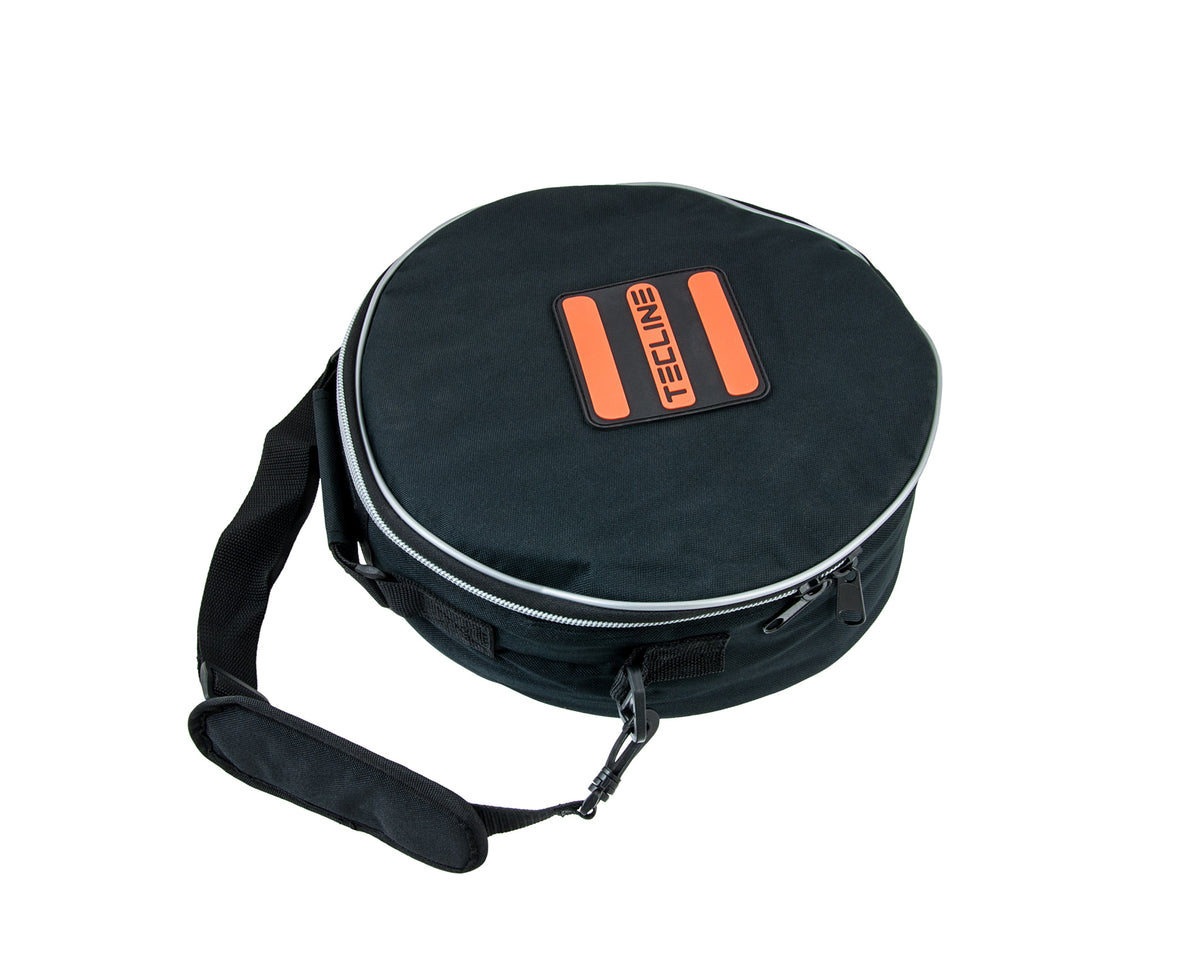 Tecline black oval regulator bag with orange Tecline logo and shoulder strap