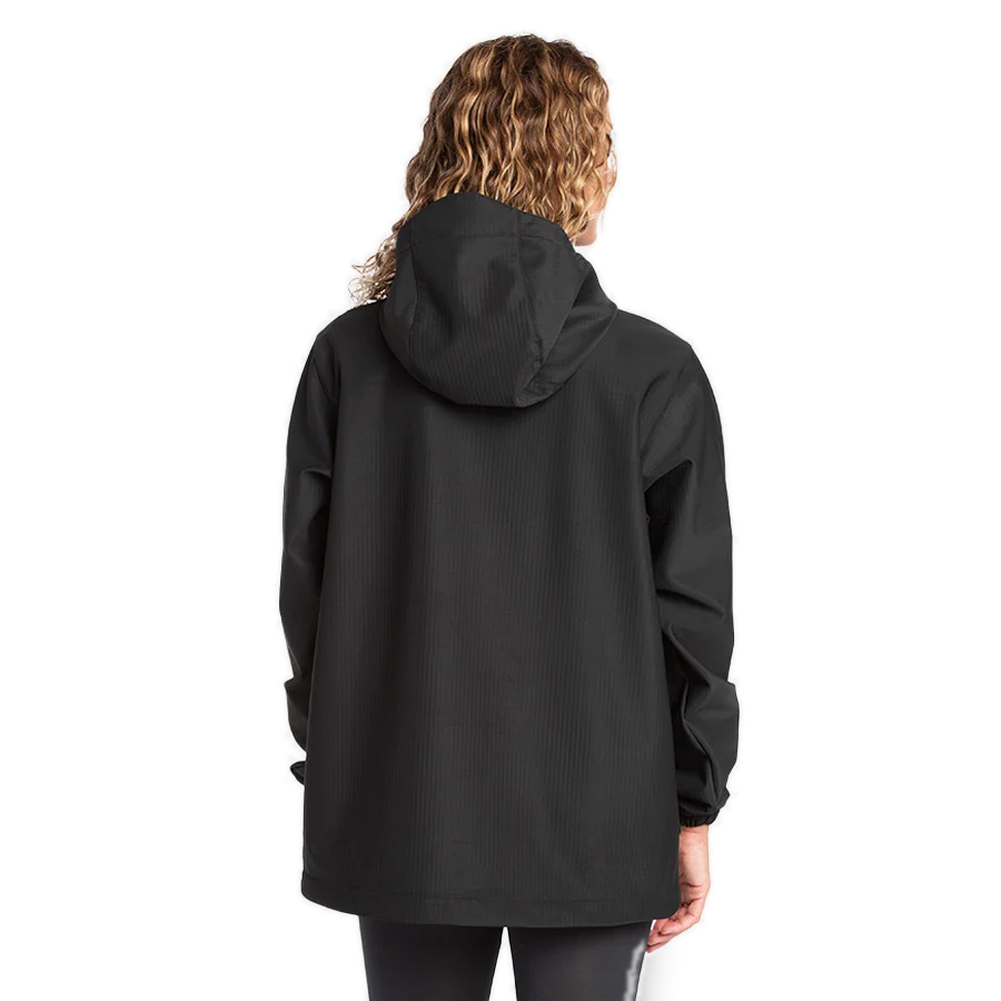 Women's Fourth Element windbreaker smock in black worn front on with the half zip and kangaroo pocket