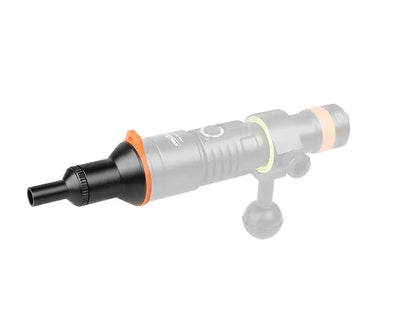 OrcaTorch snoot fitted to a dive light, shown against an outline of the torch