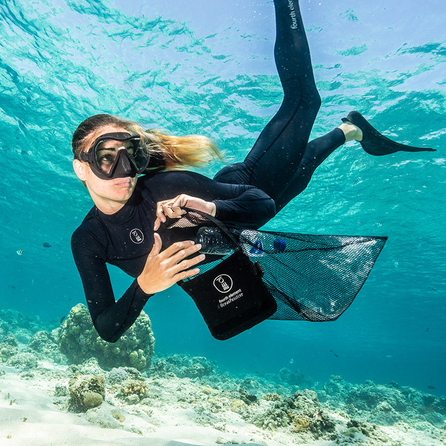 Fourth Element Women's Long Sleeve Hydroskin in use