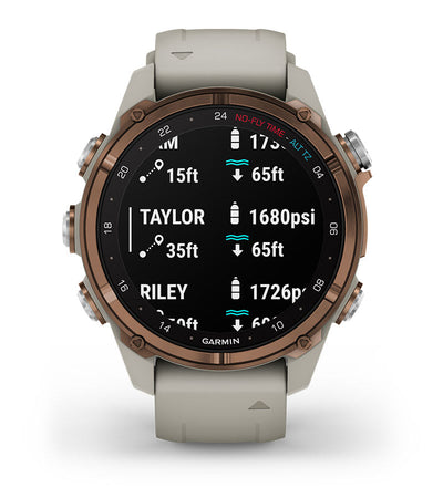 Garmin Descent Mk3i in Bronze titanium on a light grey band, showing two divers' tank pressures