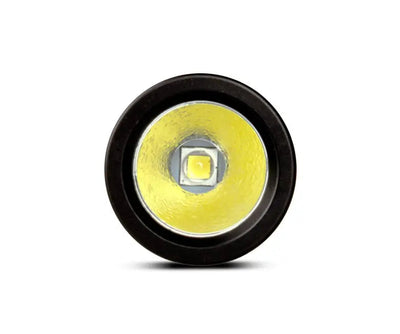 OrcaTorch D560 seen head-on, close-up of the LED behind the reflector