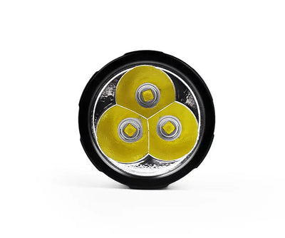 OrcaTorch D860 seen head-on, close-up of the three LEDs behind the reflector