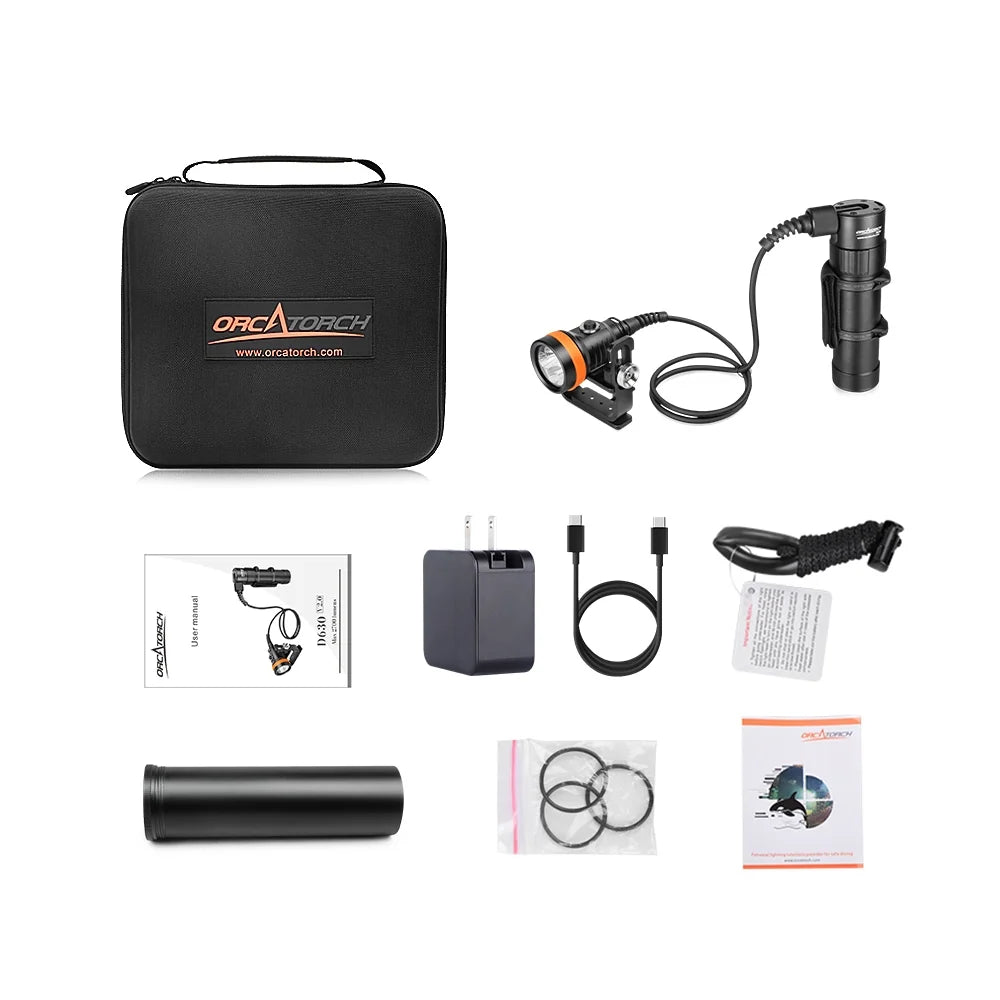 OrcaTorch D630 V2.0 kit laid out with its case, canister, charger, cables and spare O-rings