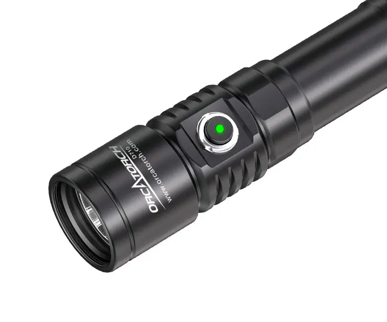 OrcaTorch D710 dive torch angled with the battery indicator lit green