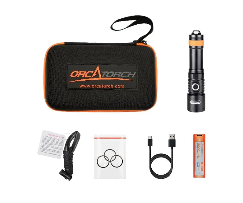 OrcaTorch D710 kit laid out with its carry case, 21700 cell, USB-C cable and spare O-rings