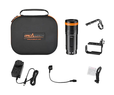 OrcaTorch D920 kit laid out with its case, charger, magnetic cable, handle and spare O-rings