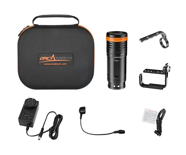 OrcaTorch D920 kit laid out with its case, charger, magnetic cable, handle and spare O-rings