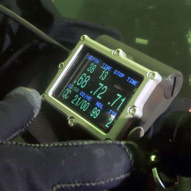 Shearwater Petrel 3 with titanium bezel, angled view showing a closed circuit trimix dive with two tank pressures