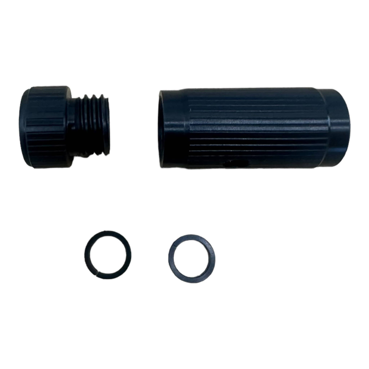 Shearwater rigid strain relief shown separated into its two threaded halves with O rings