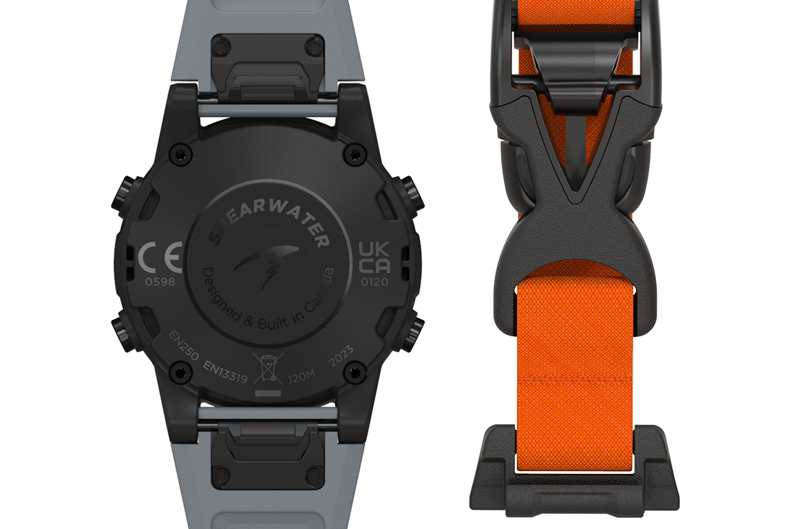 Shearwater Remora webbing strap in orange shown beside a computer case back