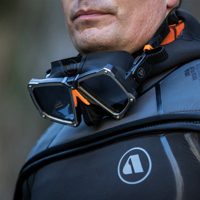 Apeks VX2 mask worn around the neck over a drysuit