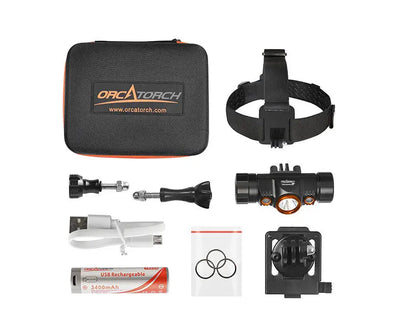 OrcaTorch Mazu TD01 kit laid out with its case, strap, cell, cable, bracket and spare O-rings