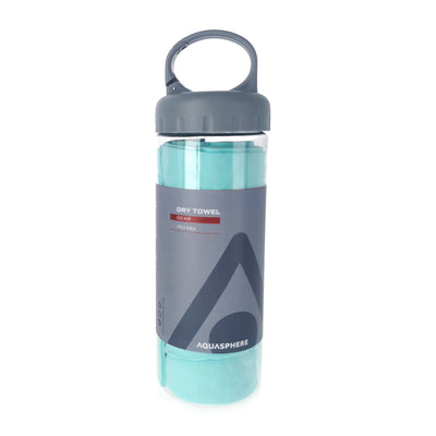 Light blue Aquasphere Dry Towel rolled inside its clear PET storage bottle