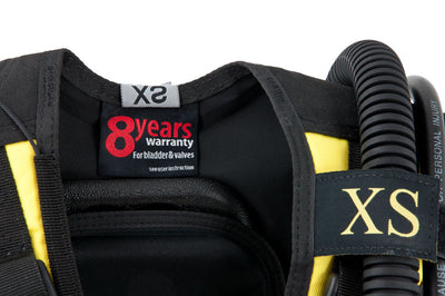 Discover BCD shoulder showing the large size label and warranty tag