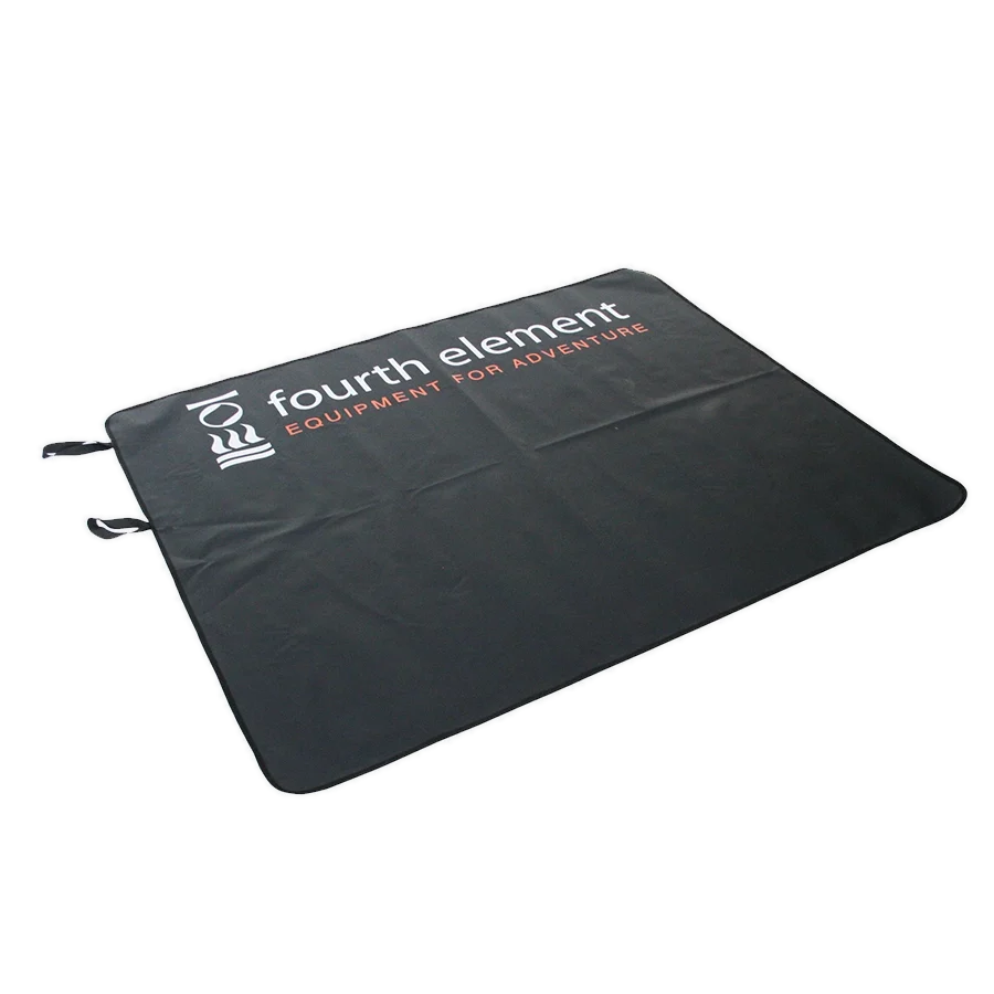 Fourth Element changing mat laid flat, showing the printed logo and the two corner carry loops