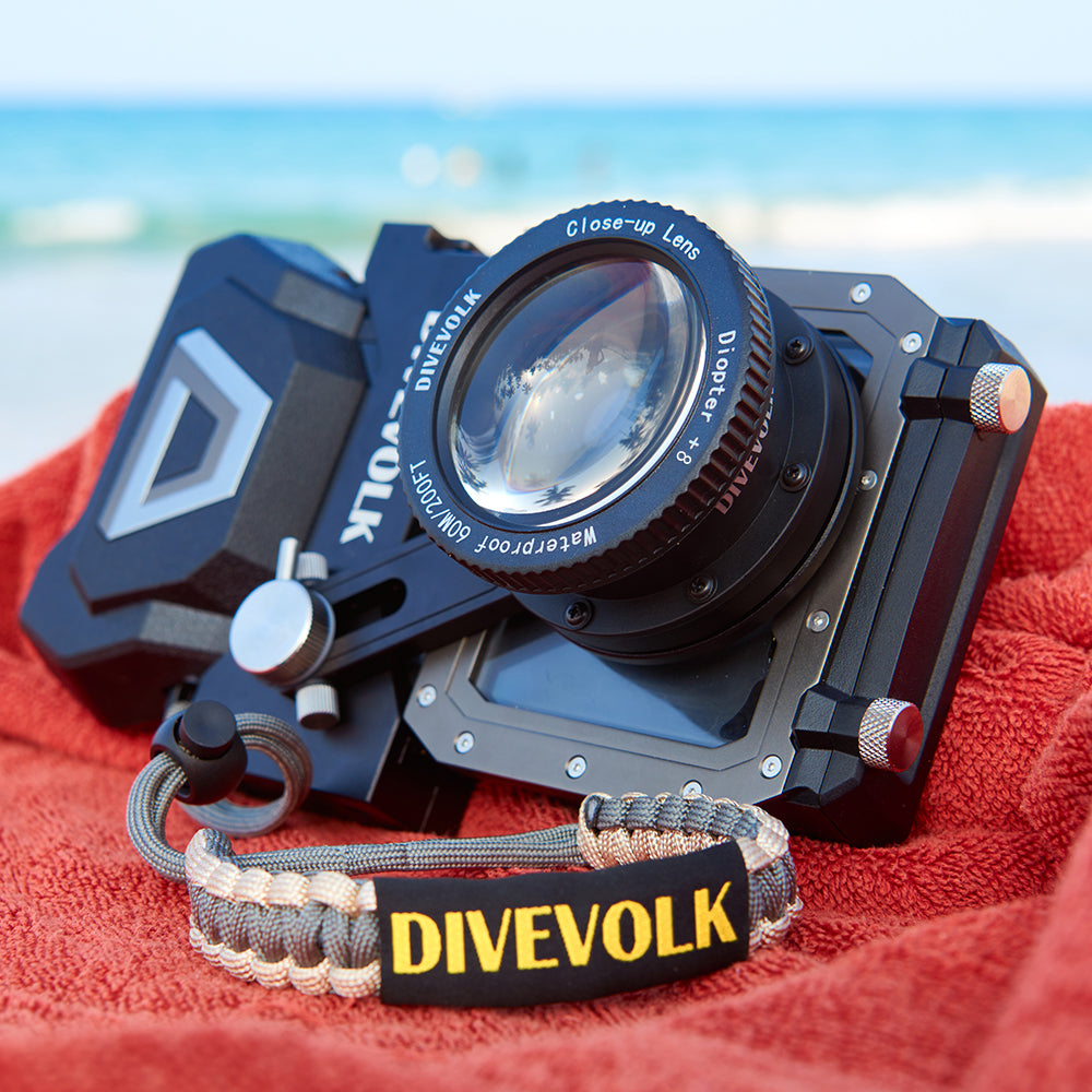 Divevolk SeaTouch 4 Max Plus Macro Kit housing with the +8 close-up lens on the expansion clamp