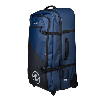 Aqua Lung Explorer 120L roller bag in navy, three-quarter view showing the wheels, compression straps and 120L marking