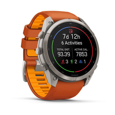 Garmin Fenix 9 Pro 51 mm, Titanium with Autumn Orange/Spark Orange band, angled view
