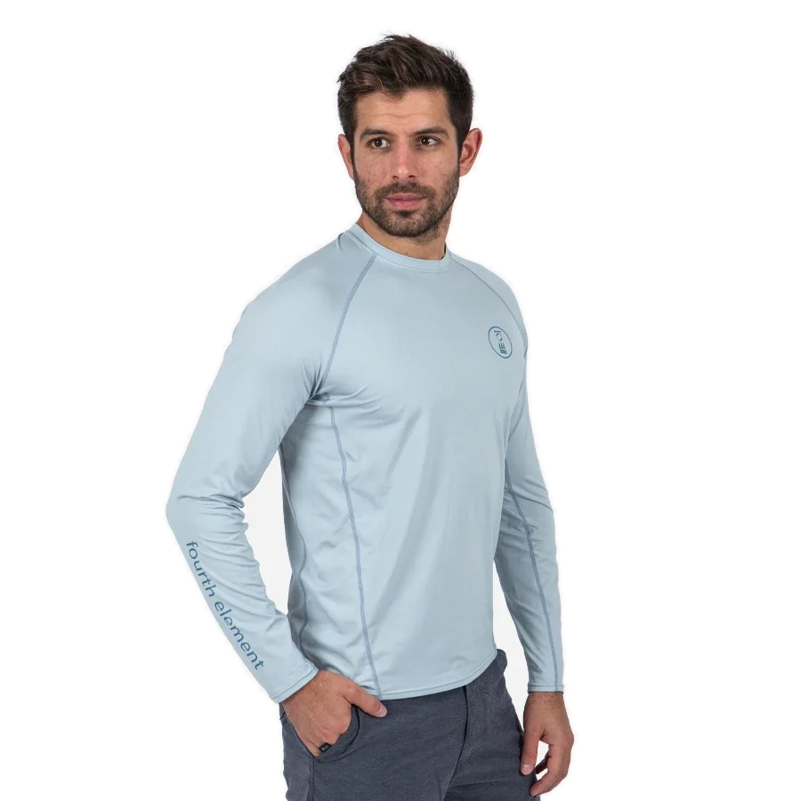 Men's Fourth Element OceanPositive long-sleeve Hydro-T in pale blue worn front on