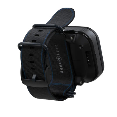 Aqua Lung i770R dive computer in black, rear view showing the charging contacts and the fabric strap keeper