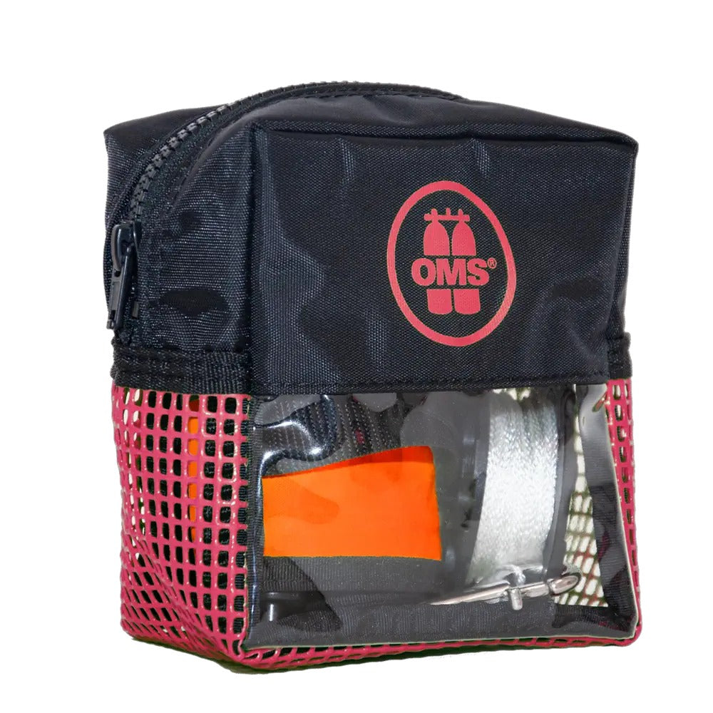 OMS Safety Set 3.3 laid out: safety pocket, rolled 1 m hybrid SMB and finger spool, shown in pink
