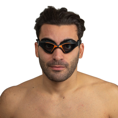 SEAC Lynx swim goggles in black and orange worn, front view