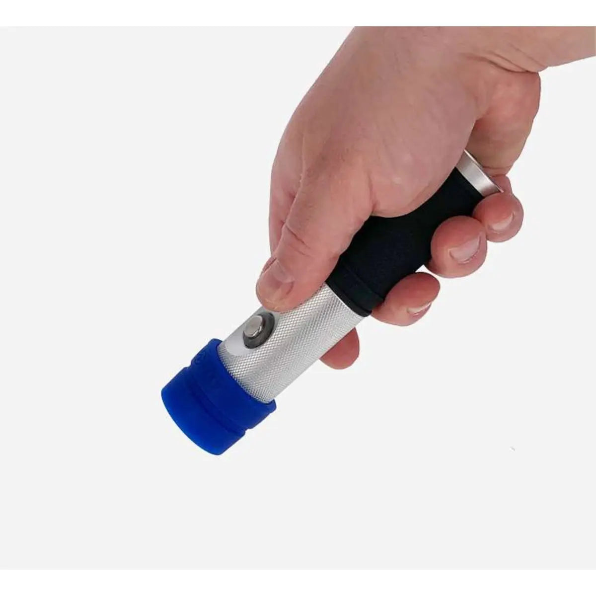 A hand holding the Aqua Lung Seaflare Mini dive torch, showing how small the body is in the palm