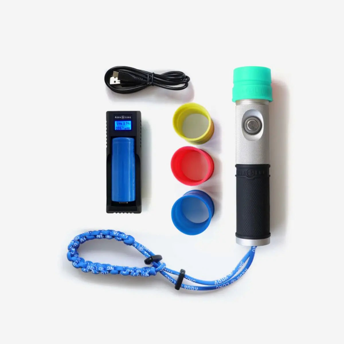 Aqua Lung Seaflare Mini kit laid out: torch, charger with rechargeable cell, USB cable, wrist lanyard and four colour deflectors