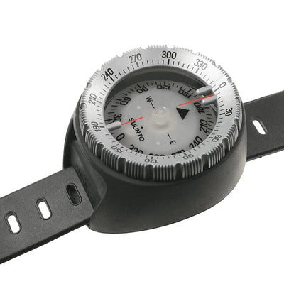 Suunto SK-8 dive compass on a wrist strap mount, angled view showing the housing depth